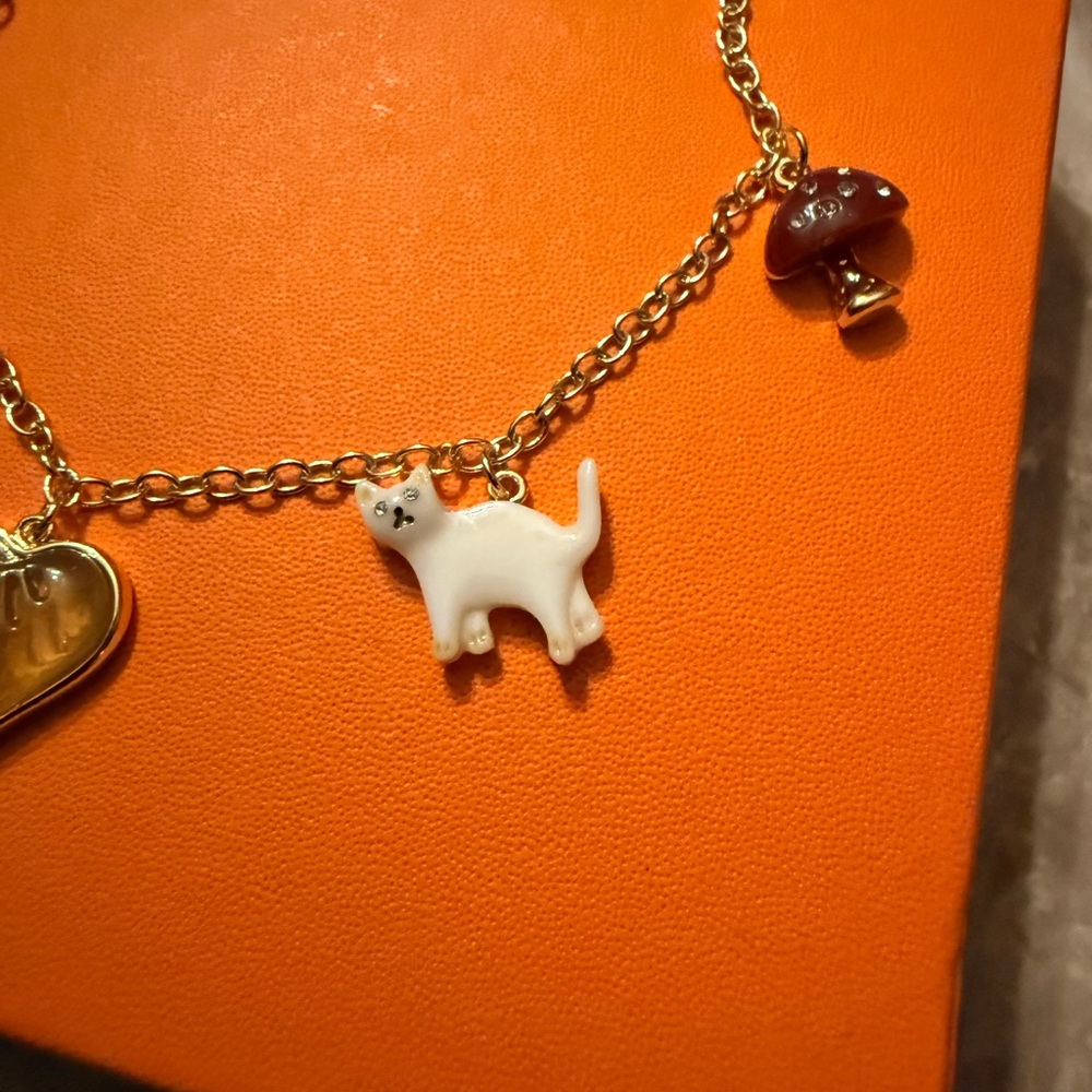 Coach Gold creature multi Charm Bracelet with Amber Heart & White Cat Charm - Picture 5 of 10